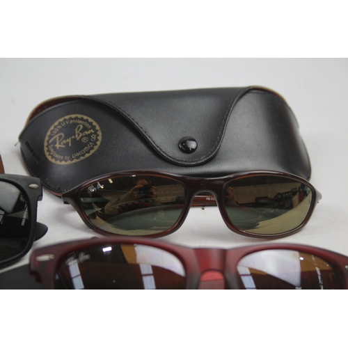 2180 - Three pairs of cased Ray-Ban sunglasses