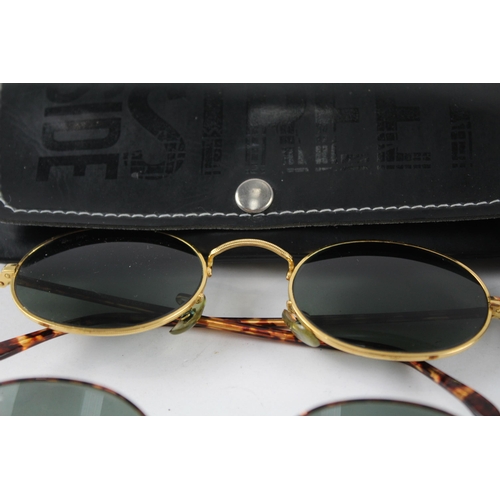 2181 - Three pairs of cased Ray-Ban sunglasses