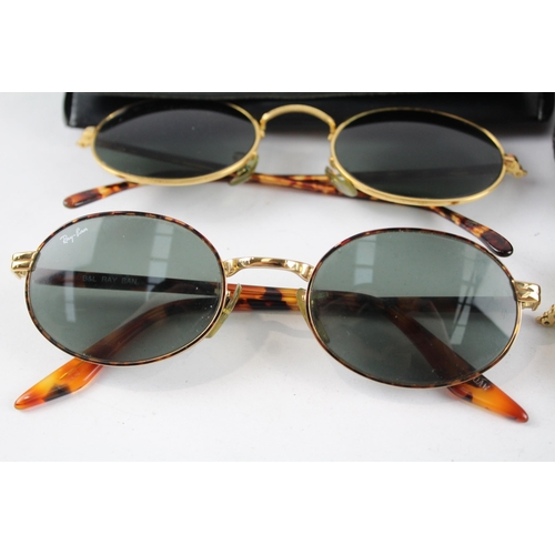 2181 - Three pairs of cased Ray-Ban sunglasses