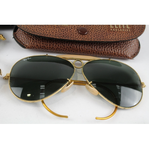 2181 - Three pairs of cased Ray-Ban sunglasses