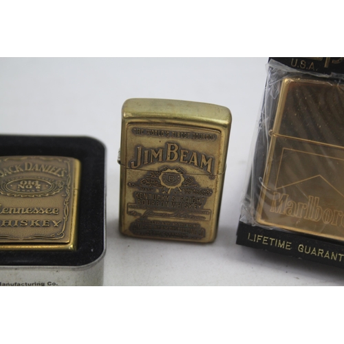 2186 - Three Zippo cigarette lighters