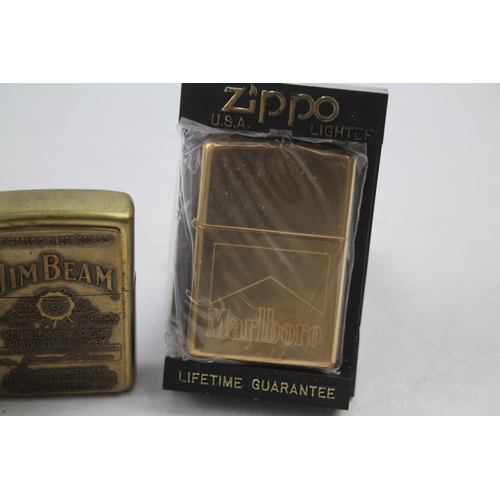 2186 - Three Zippo cigarette lighters