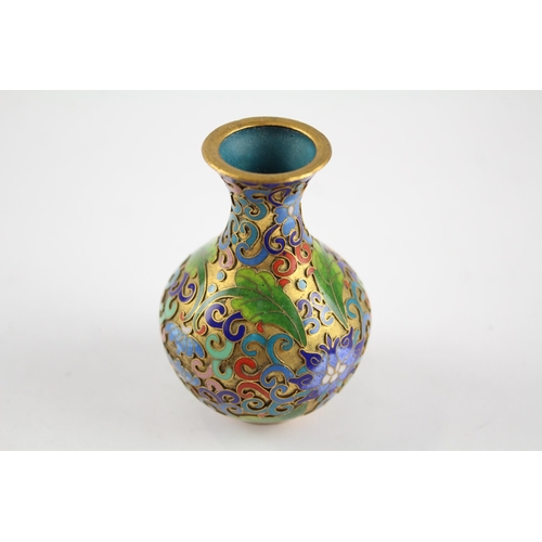 2194 - A cloisonné and brass bud vase - approx. 8.5cm high