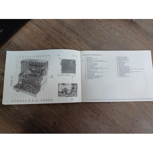 609 - A cased Eumig S938 stereo sound Super8 cine projector with microphone, spool and instruction manual