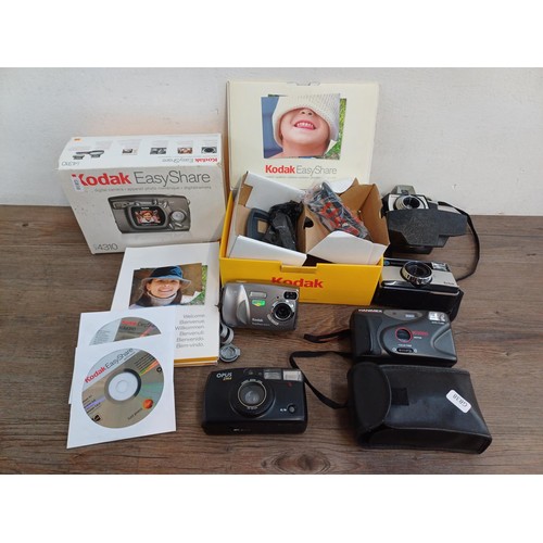 619 - Five cameras, one boxed Kodak EasyShare CX4310 3.2mp digital with software disc and accessories, one... 