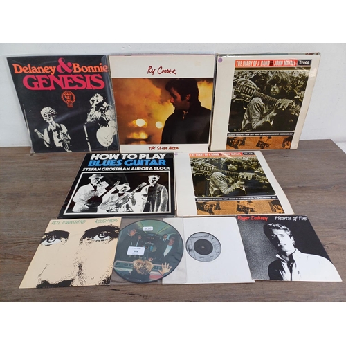 668 - A collection of vinyl records to include John Mayall, Delaney & Bonnie, Pete Townshend, Roger Daltre... 