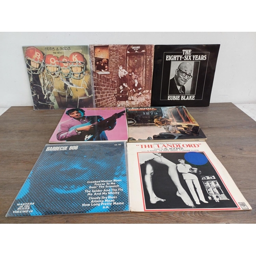 668 - A collection of vinyl records to include John Mayall, Delaney & Bonnie, Pete Townshend, Roger Daltre... 