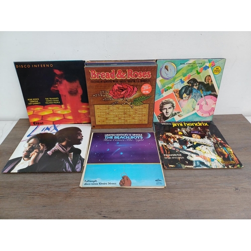 675 - A collection of vinyl records to include Asia and Anthrax shaped picture discs, Crosby Stills & Nash... 