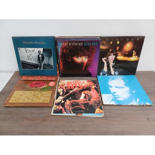 675 - A collection of vinyl records to include Asia and Anthrax shaped picture discs, Crosby Stills & Nash... 