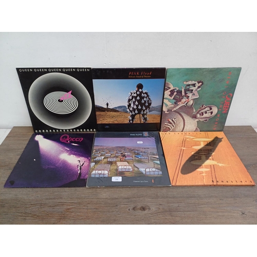 676 - Six LP vinyl records, Pink Floyd 'Delicate Sound of Thunder' and 'A Momentary Lapse of Reason', Quee... 