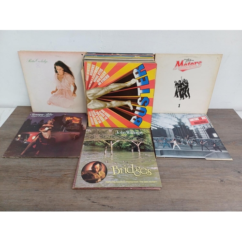 677 - A collection of vinyl records to include Generation X, Andy Summers & Robert Fripp, Judas Priest, Li... 