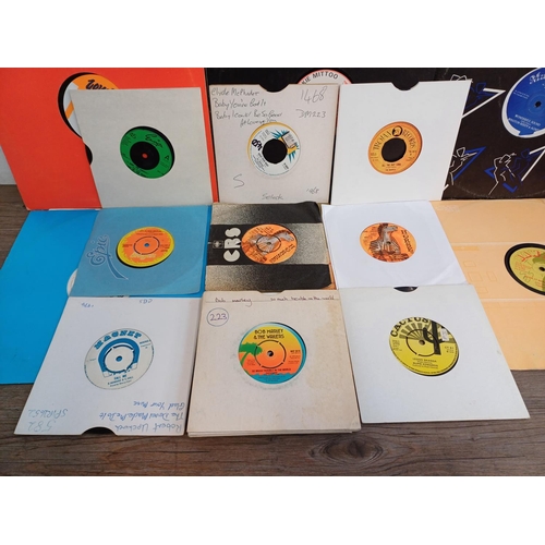 680 - A collection of reggae vinyl records to include Cutty Ranks, Jackie Mittoo, The Marvels, Bob Marley ... 