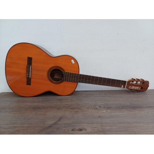 689 - An Antoria full sized nylon strung classical guitar