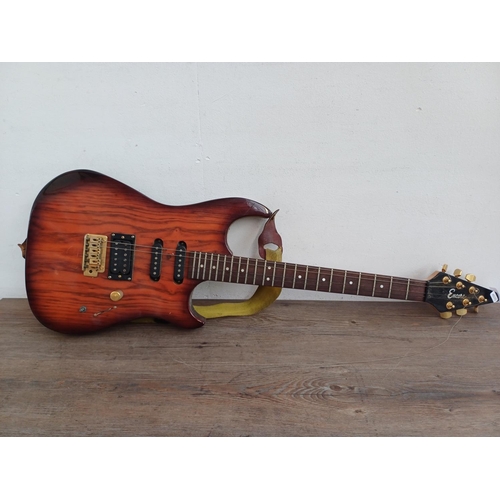 692 - An Encore HSS double cutaway electric guitar