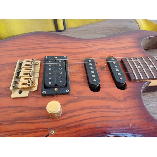 692 - An Encore HSS double cutaway electric guitar