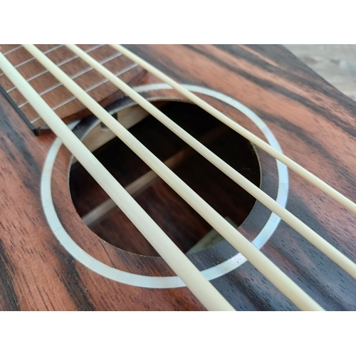 694 - An Aklot AKBU30 fretless electro-acoustic bass ukulele