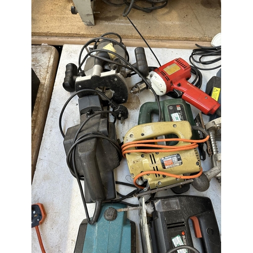 835 - Ten 240v power tools to include three plunge routers, four sanders, two scroll saws etc.