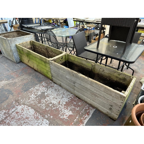 846 - A pair of pine rectangular planters - approx. 53cm high x 135cm long x 47cm wide