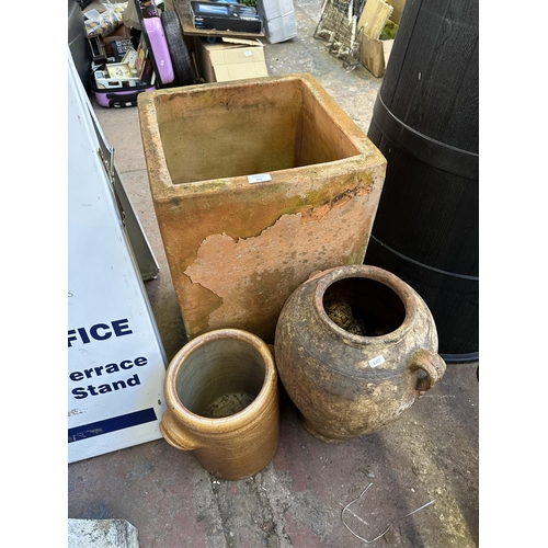 852 - Three terracotta planters