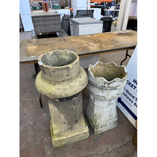 853 - Two 19th century cast stone chimney pot planters - largest approx. 90cm high