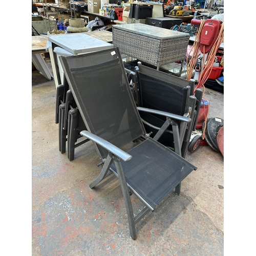 858 - A set of five folding garden chairs