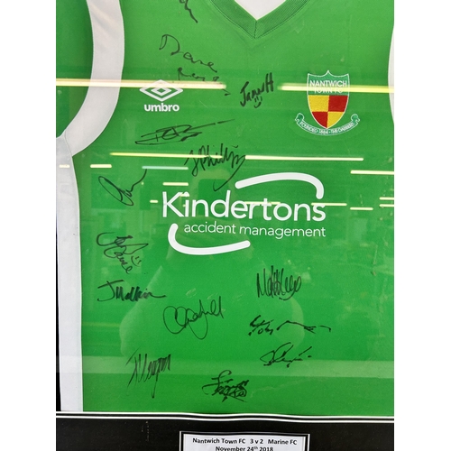 508 - A framed Nantwich town FC signed shirt - approx. 86cm high x 65cm wide