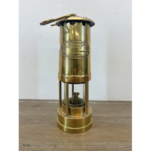 509 - An early 20th century E. Thomas & Williams Ltd brass miners lamp - approx. 25cm high