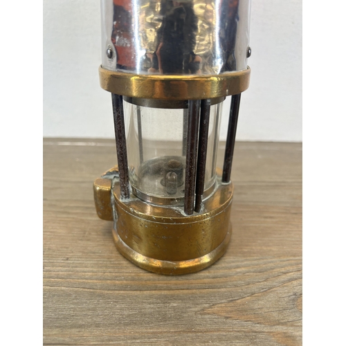 510 - An early 20th century Protector Lamp & Lighting Co Ltd type SL M&Q miners lamp - approx. 23cm high