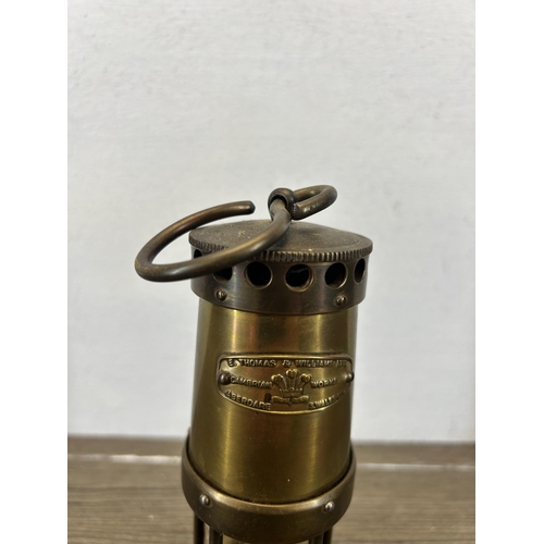 511 - A vintage E. Thomas & Williams Ltd miniature brass miners lamp - approx. 16cm high