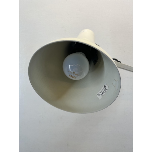 518 - A vintage Anglepoise white articulated desk lamp