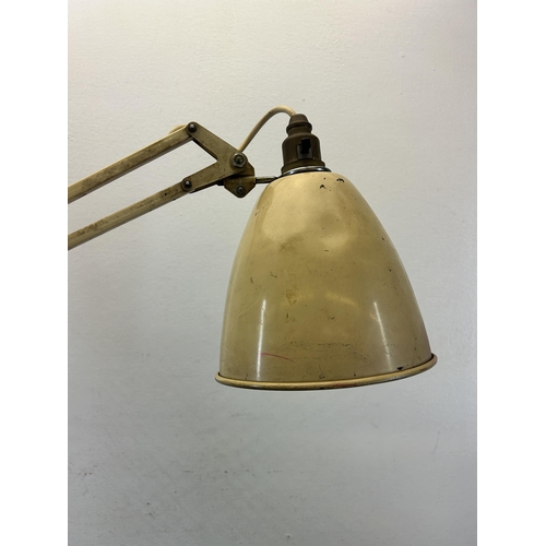 523 - A mid 20th century Herbert Terry & Sons Ltd Anglepoise cream painted articulated desk lamp