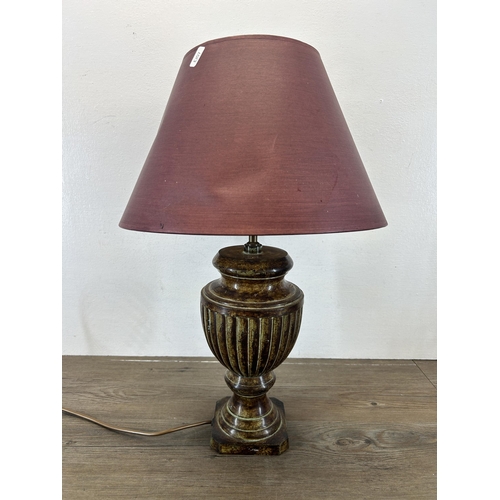 524 - A 19th century style patinated cast metal table lamp