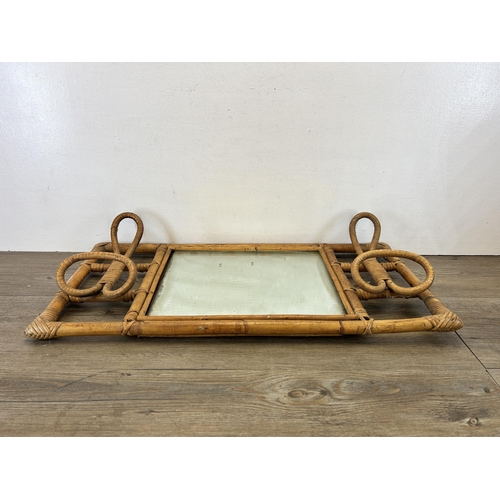 528 - A mid 20th century bamboo rectangular wall mirror - approx. 70cm wide x 34cm high