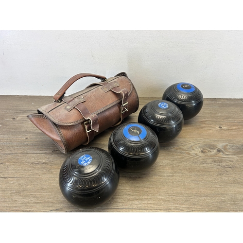 531 - A collection of vintage crown green bowls, one pair of leather cased and four Taylor-Rolph Co Ltd ty... 