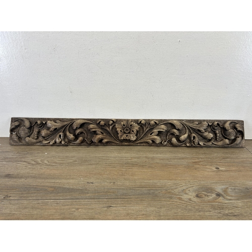 542 - A 19th century carved oak panel - approx. 73cm long x 8.5cm wide