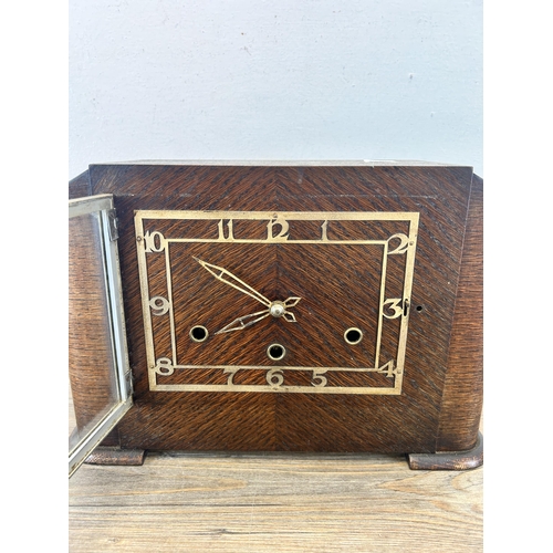 544 - An Art Deco oak Westminster chime mantel clock - approx. 22cm high x 32cm wide x 12cm deep