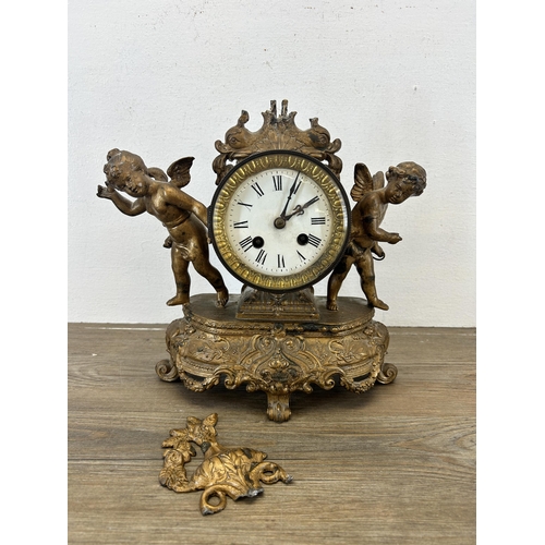 545 - A 19th century Japy Frères gilt chiming mantel clock with putti and repousse design - approx. 29cm h... 