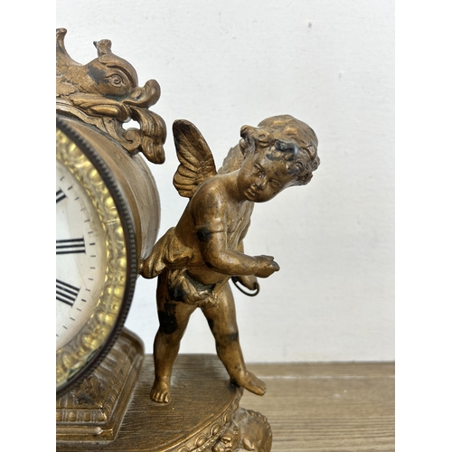 545 - A 19th century Japy Frères gilt chiming mantel clock with putti and repousse design - approx. 29cm h... 