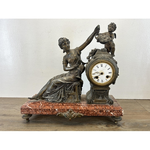 546 - A 19th century Japy Frères cast spelter and gilded chiming mantel clock with putti and figural desig... 