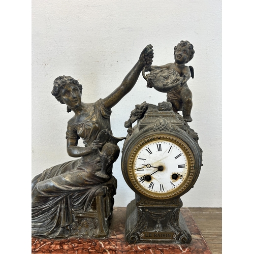 546 - A 19th century Japy Frères cast spelter and gilded chiming mantel clock with putti and figural desig... 