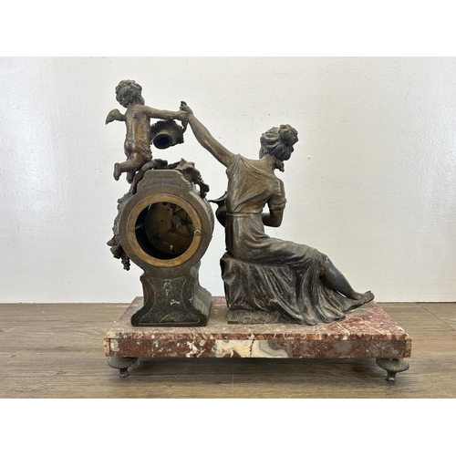 546 - A 19th century Japy Frères cast spelter and gilded chiming mantel clock with putti and figural desig... 