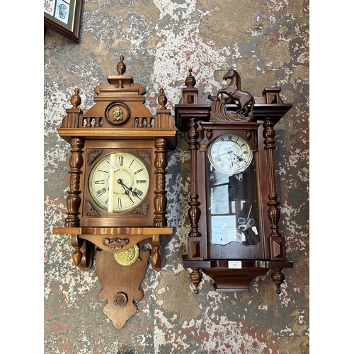 553 - Two 19th century style chiming wall clocks