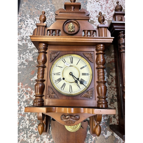 553 - Two 19th century style chiming wall clocks