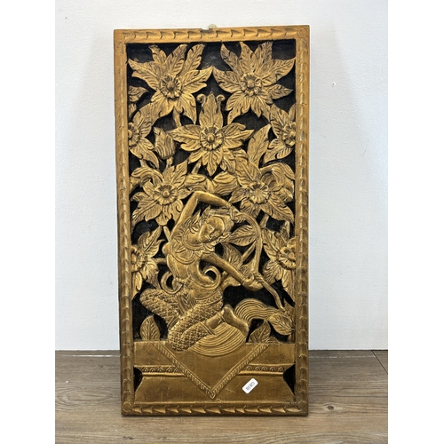 554 - A vintage Thai carved wooden and gold painted panel - approx. 61cm high x 30cm wide