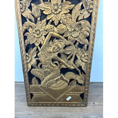 554 - A vintage Thai carved wooden and gold painted panel - approx. 61cm high x 30cm wide