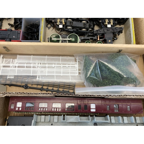A collection of model railway parts and accessories to include