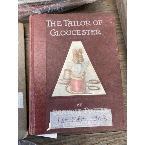 498 - A large collection of Beatrix Potter books to include The Tailor of Gloucester, The Tale of Two Bad ... 