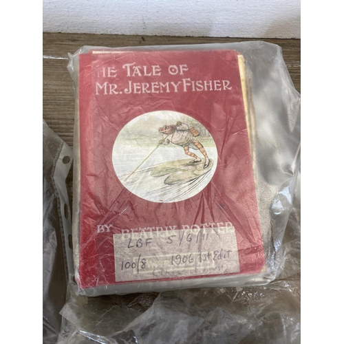 498 - A large collection of Beatrix Potter books to include The Tailor of Gloucester, The Tale of Two Bad ... 