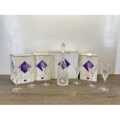 336 - Seven pieces of boxed Edinburgh Crystal The Continental Collection glassware, six 20cm wine glasses ... 