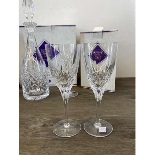 336 - Seven pieces of boxed Edinburgh Crystal The Continental Collection glassware, six 20cm wine glasses ... 